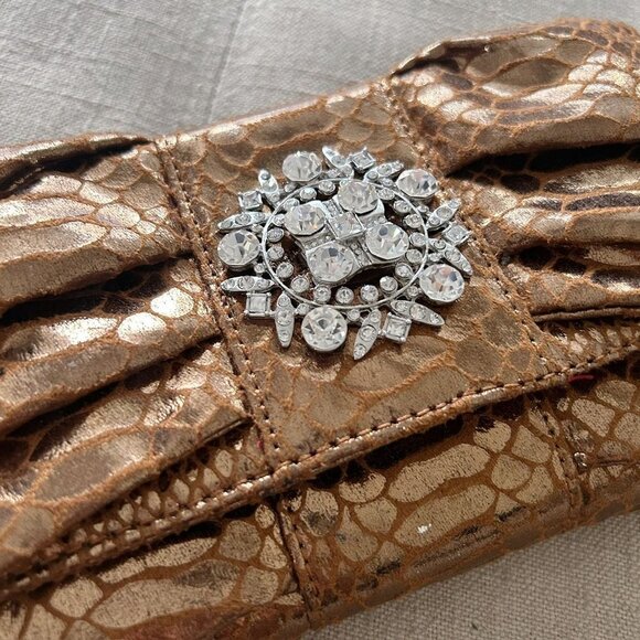 Iman Bronze Metallic Snake Embossed Bow Shaped Clutch with Crystal Embellishment - Picture 2 of 8